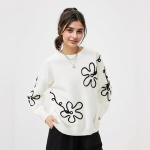 Carolyn Taylor White Sweater with Black Floral Pattern